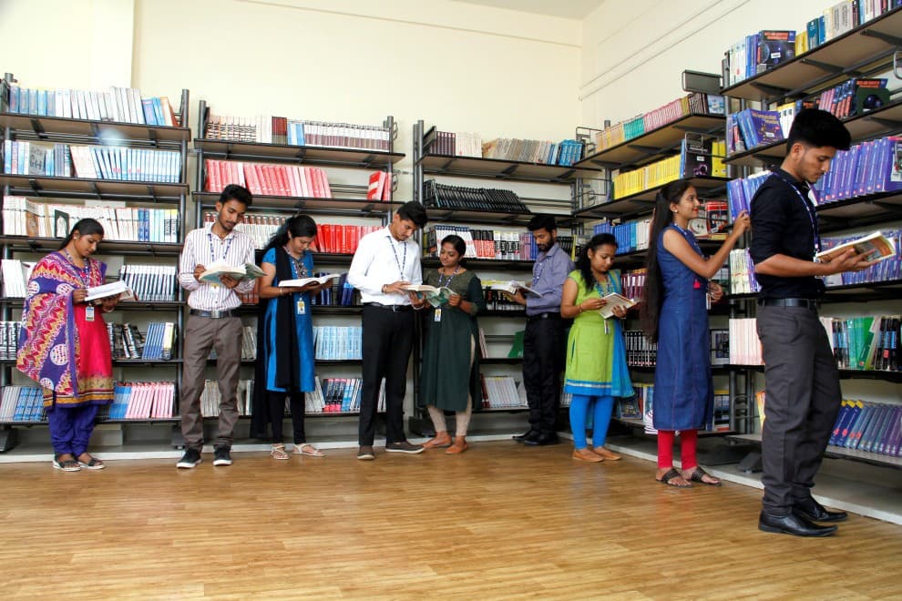 BIHE students reading books in the BIHE library